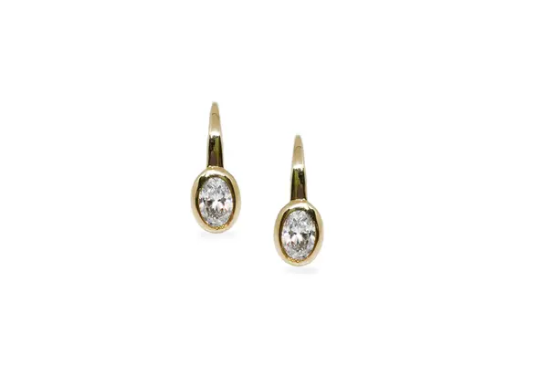 Golden earrings with Zirconia