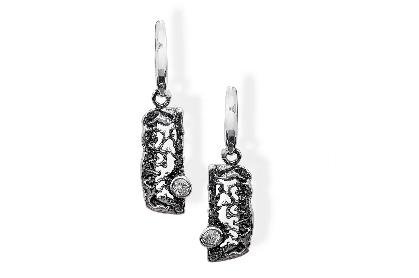 Silver earrings with Zircons