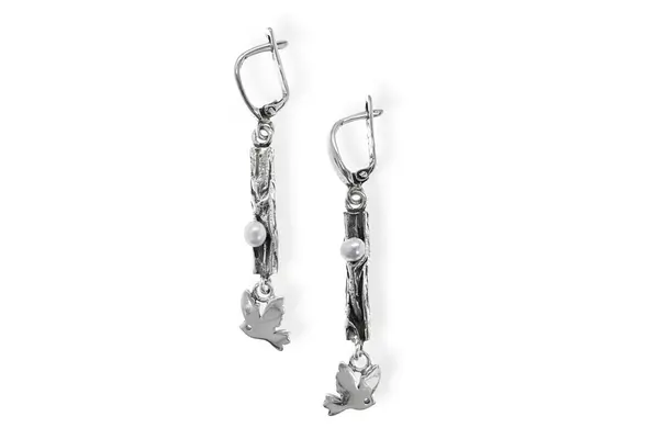 One-of-a-kind earrings with a hanging bird