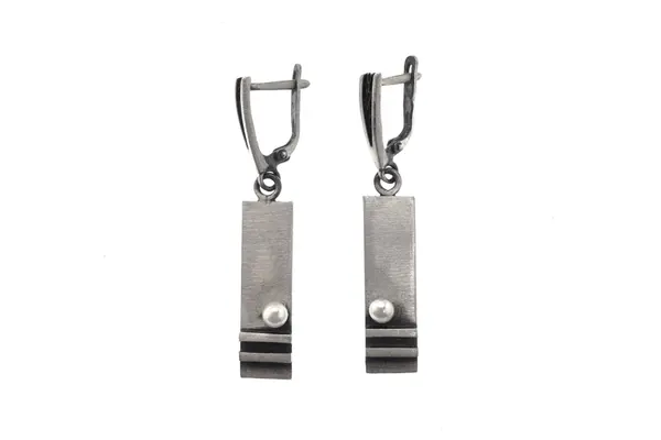 One-of-a-kind earrings with Cultured pearl