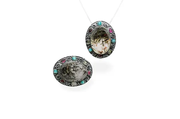 Exclusive pendant (brooch) with various gemstones